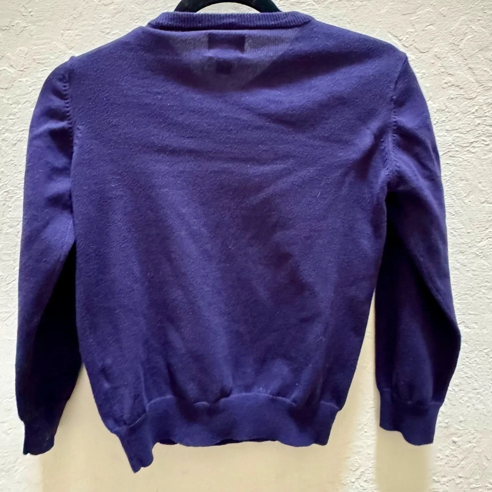 Gently used boys sweater. Blue v neck sweater. Boys size 7/8.